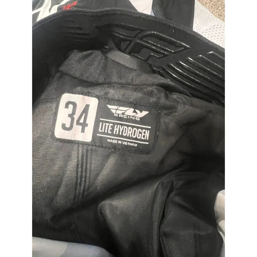 Fly Racing Men’s lite Hydrogen shirt and riding pants large and 34